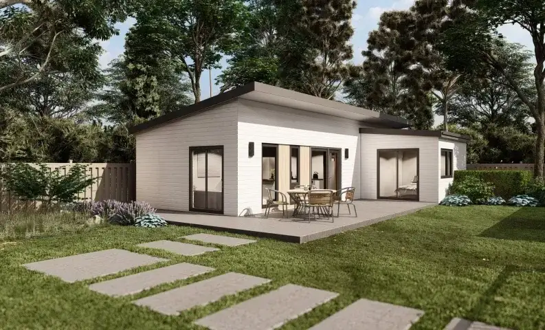 Backyard accessory dwelling unit with a patio and stepping stones