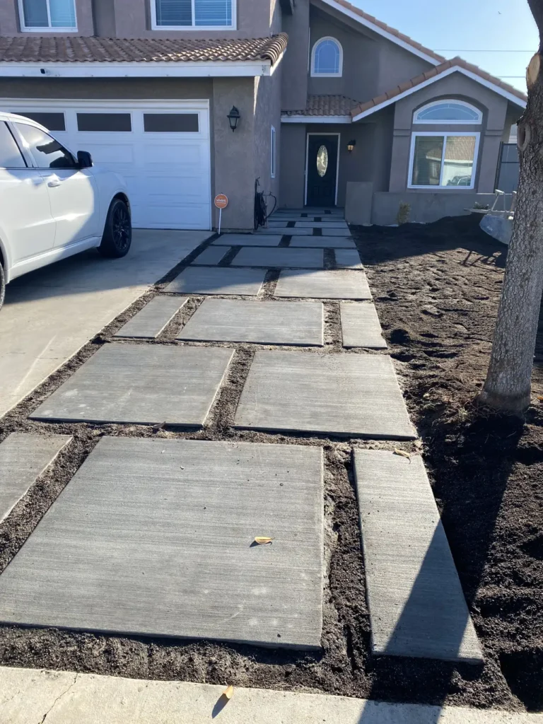 New concrete walkway and front yard built by TCS Construction in Moreno Valley