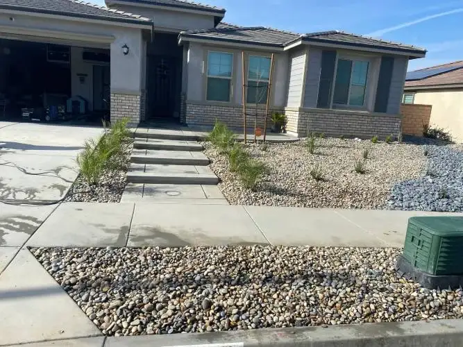New single story home with fresh landscaping built by TCS Construction